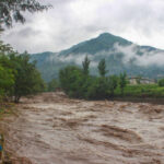 Heavy Flood after Heavy Rain In the Local Stream. Flood Water Entered very Fast to the Houses and Shops . Houses to Near The Bank and Things which are commonly Use are Destroyed Badly. This Picture is of the 1st  day of Flood and the water Level is Decreased This Time. Date 24th Of August 2022. Mingora Swat Pakistan.