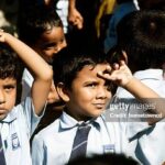 Chilaw, Sri Lanka - April 7, 2009: Elementary School children watching the game during annual sports meet.