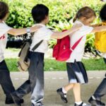 group-of-diverse-kindergarten-students-walking-together-600x430