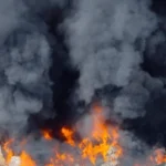 aerial-view-fire-industrial-building-260nw-2332791723
